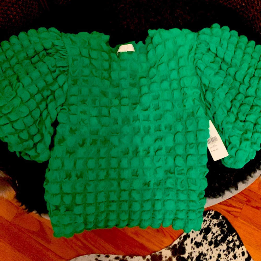 Green textured top.